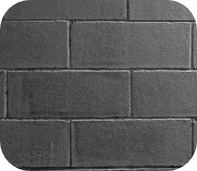 Mur en blocs de béton gris – structure robuste et minimaliste.